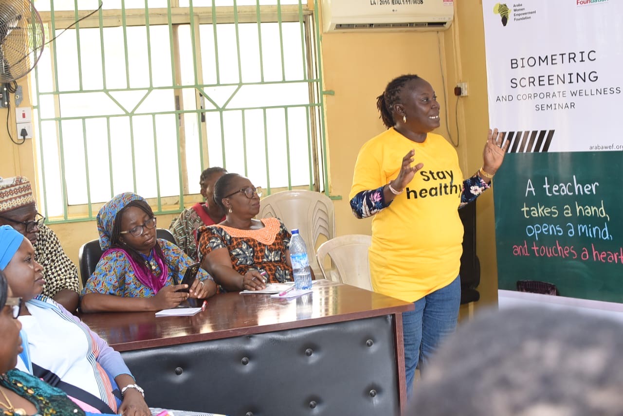 speaker leading wellness seminar for teachers